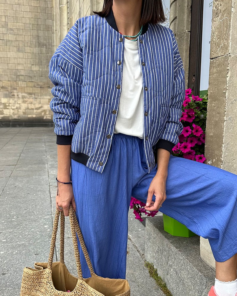 Navy blue and white quilted bomber jacket with lining